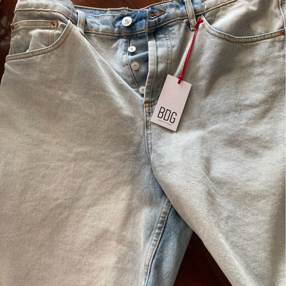 Brand New with Tags. “dad” style Jean shorts with fray.